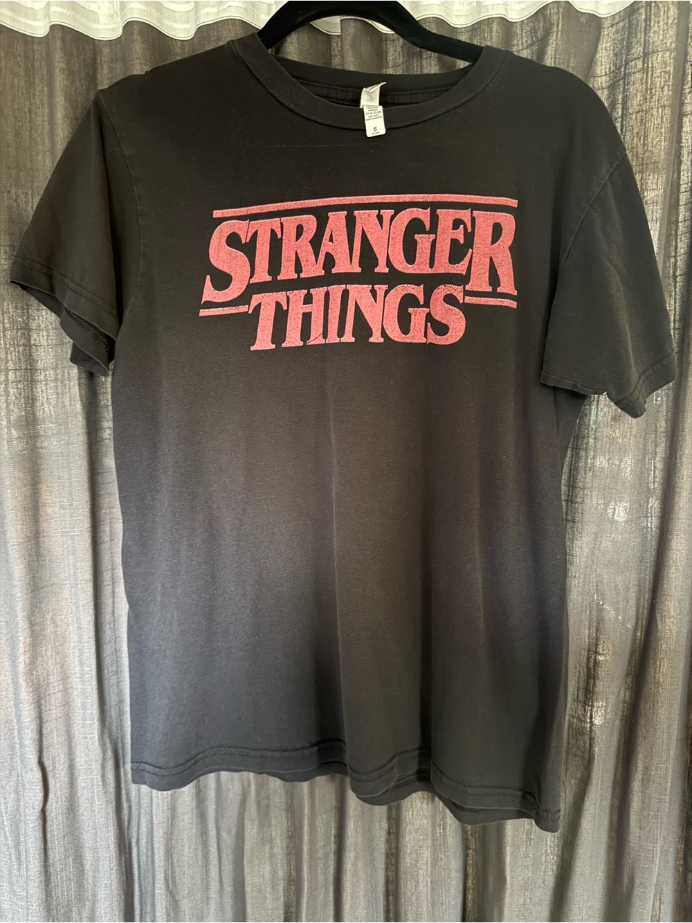 Stranger Things Black Graphic Tee with Pink Logo